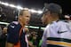 DENVER, CO - NOVEMBER 01: Quarterbacks Aaron Rodgers #12 (R) of the Green Bay Packers and Peyton Manning #18 (L) of the Denver Broncos talk while surrounded by media after the Broncos 29-10 win at Sports Authority Field at Mile High on November 1, 2015 i