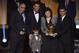 Real Madrid and Portugal forward Cristiano Ronaldo (C) poses with his son Cristiano Jr (2nd L), mother Dolores (2nd R), brother Hugo (R) and an unidentified family member after receiving the 2014 FIFA Ballon d'Or award for player of the year during the