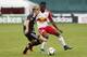 Nov 1, 2015; Washington, DC, USA; D.C. United forward Chris Rolfe (18) and New York Red Bulls defender Kemar Lawrence (92) battle for the ball in the first half of the first leg of the eastern conference semi-final at Robert F. Kennedy Memorial Stadium. M