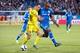 Nov 1, 2015; Montreal, Quebec, CAN; Columbus Crew midfielder Ethan Finlay (13) and Montreal Impact Nigel Reo-Coker (14) battle for control of the ball in the second half at Stade Saputo. The Impact defeated the Columbus Crew 2-1. Mandatory Credit: Marc De