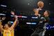 October 28, 2015; Los Angeles, CA, USA; Minnesota Timberwolves guard Kevin Martin (23) shoots against the defense of Los Angeles Lakers guard Jordan Clarkson (6) and center Roy Hibbert (17) during the second half at Staples Center. Mandatory Credit: Gary