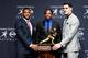 NEW YORK, NY - DECEMBER 13: (L-R) Amari Cooper, Melvin Gordon, and Marcus Mariota pose for a picture with the Heisman Trophy during a press conference at the New York Marriott Marquis on December 13, 2014 in New York City. (Photo by Alex Goodlett/Getty