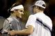HOUSTON - NOVEMBER 15: Roger Federer of Switzerland is congratulated by Andy Roddick after their match during the Tennis Masters Cup November 15, 2003 at the Westside Tennis Club in Houston, Texas. (Photo by Matthew Stockman/Getty Images)
