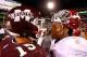 STARKVILLE, MS - NOVEMBER 14: Dak Prescott #15 of the Mississippi State Bulldogs congratulates Derrick Henry #2 of the Alabama Crimson Tide on their 31-6 win at Davis Wade Stadium on November 14, 2015 in Starkville, Mississippi. (Photo by Kevin C. Cox/G