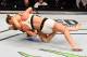MELBOURNE, AUSTRALIA - NOVEMBER 15: Ronda Rousey takes down Holly Holm in their UFC women's bantamweight championship bout during the UFC 193 event at Etihad Stadium on November 15, 2015 in Melbourne, Australia. (Photo by Josh Hedges/Zuffa LLC/Zuffa LLC