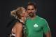 MELBOURNE, AUSTRALIA - NOVEMBER 15: UFC women's bantamweight champion Holly Holm (L) poses with her husband Jeff Kirkpatrick backstage for a post-fight portrait after the UFC 193 event at Etihad Stadium on November 15, 2015 in Melbourne, Australia. Holly