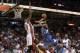 Nov 17, 2015; Miami, FL, USA; Minnesota Timberwolves guard Andrew Wiggins (right) collides into Miami Heat forward Luol Deng (bottom) as Miami Heat center Hassan Whiteside (left) blocks the basket during the first half at American Airlines Arena. Mandator