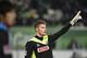 Cologne's goalkeeper Timo Horn raises his hand during the German first division Bundesliga football match VfL Wolfsburg vs 1 FC Cologne at the Volkswagen Arena in Wolfsburg, central Germany on December 20, 2014. AFP PHOTO / TOBIAS SCHWARZ RESTRICTIONS -