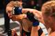 MELBOURNE, AUSTRALIA - NOVEMBER 15: (R-L) Holly Holm of the United States punches Ronda Rousey of the United States in their UFC women's bantamweight championship bout during the UFC 193 event at Etihad Stadium on November 15, 2015 in Melbourne, Australi