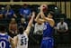 Nov 27, 2014; Kissimmee, FL, USA; Kansas Jayhawks guard Sviatoslav Mykhailiuk (10) shoots over Rhode Island Rams forward Gilvydas Biruta (55) during the first half at HP Field house at Wide World of Sports Complex. Mandatory Credit: Kim Klement-USA TODAY