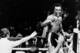 US boxer Sugar Ray Leonard (R) celebrates after winning his World Boxing Council welterweight championship fight against Panamanian boxer Roberto Duran (not pictured) on November 25, 1980 in New Orleans Superdome. (Photo credit should read -/AFP/Ge