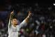 Real Madrid's Portuguese forward Cristiano Ronaldo celebrates his second goal during the UEFA Champions League group A football match Real Madrid CF vs FC Shakhtar Donetsk at the Santiago Bernabeu stadium in Madrid on September 15, 2015. AFP PHOTO/ PIERRE