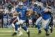 DETROIT, MI - OCTOBER 18: Quarterback Matthew Stafford #9 of the Detroit Lions scrambles with the football during the NFL game against the Chicago Bears at Ford Field on October 18, 2015 in Detroit, Michigan. The Lions defeated the Bears 37-34 in overtim