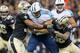 NEW ORLEANS, LA - NOVEMBER 8: Craig Stevens #88 of the Tennessee Titans is tackled after catching a pass by Jairus Byrd #31 and Kenny Vaccaro #32 of the New Orleans Saints at Mercedes-Benz Superdome on November 8, 2015 in New Orleans, Louisiana. The Tit