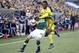 Dec 6, 2015; Columbus, OH, USA; Columbus Crew defender Harrison Afful (25) battles for the ball with Portland Timbers defender Jorge Villafana (19) during the first half in the 2015 MLS Cup championship game at MAPFRE Stadium. Mandatory Credit: Geoff Burk