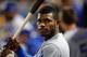 Oct 13, 2015; New York City, NY, USA; Los Angeles Dodgers right fielder Yasiel Puig (66) in the dugout prior to game four of the NLDS against the New York Mets at Citi Field. Mandatory Credit: Brad Penner-USA TODAY Sports