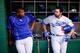 PITTSBURGH, PA - AUGUST 09: Yasiel Puig #66 and Adrian Gonzalez #23 of the Los Angeles Dodgers in action against the Pittsburgh Pirates during the game at PNC Park on August 9, 2015 in Pittsburgh, Pennsylvania. (Photo by Jared Wickerham/Getty Images)