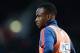 West Bromwich Albion's substitute Saido Berahino watches from the touchline during the English Premier League football match between West Ham United and West Bromwich Albion at The Boleyn Ground in Upton Park, East London on November 29, 2015. The game fi