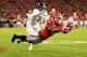 ATHENS, GA - NOVEMBER 21: Terry Godwin #5 of the Georgia Bulldogs catches a touchdown pass against Darius Jones #5 of the Georgia Southern Eagles during the second half at Sanford Stadium on November 21, 2015 in Athens, Georgia. (Photo by Daniel Shirey/