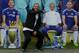A man poses by a picture of the Chelsea team and points to Chelsea's former Portuguese manager Jose Mourinho before the English Premier League football match between Chelsea and Sunderland at Stamford Bridge in London on December 19, 2015.
AFP PHOTO / IK