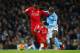 MANCHESTER, ENGLAND - NOVEMBER 21: Christian Benteke of Liverpool and Eliaquim Mangala of Manchester City compete for the ball during the Barclays Premier League match between Manchester City and Liverpool at Etihad Stadium on November 21, 2015 in Manche