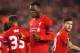 LIVERPOOL, ENGLAND - NOVEMBER 26: Christian Benteke of Liverpool celebrates as he scores their second goal during the UEFA Europa League Group B match between Liverpool FC and FC Girondins de Bordeaux at Anfield on November 26, 2015 in Liverpool, United