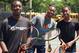 Lendale Johnson (middle) works with area Chicago youth at a local event.
