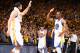 OAKLAND, CA - JUNE 4: Teammates Andrew Bogut #12 of the Golden State Warriors and Andre Iguodala #9 of the Golden State Warriors high-five during Game One of the 2015 NBA Finals on June 4, 2015 at Oracle Arena in Oakland, California. NOTE TO USER: User ex