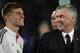 Real Madrid's Italian coach Carlo Ancelotti (R) and German midfielder Toni Kroos smile at the end of the FIFA Club World Cup final football match against San Lorenzo at the Marrakesh stadium in the Moroccan city of Marrakesh on December 20, 2014. Real Mad
