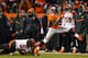 DENVER, CO - DECEMBER 28: Running back C.J. Anderson #22 of the Denver Broncos breaks away from a tackle attempt by middle linebacker Rey Maualuga #58 of the Cincinnati Bengals as he rushes for a 39 yard fourth quarter go-ahead touchdown during a game at