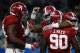 ARLINGTON, TX - DECEMBER 31: Derrick Henry #2 of the Alabama Crimson Tide celebrates scoring a touchdown in the second quarter with teammates offensive lineman Cam Robinson #74 and Jarran Reed #90 against the Michigan State Spartans during the Goodyear C