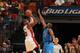 MIAMI, FL - JANUARY 1: Dwyane Wade #3 of the Miami Heat shoots the ball against Raymond Felton #2 of the Dallas Mavericks on January 1, 2016 at American Airlines Arena in Miami, Florida. NOTE TO USER: User expressly acknowledges and agrees that, by downl