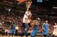 MIAMI, FL - JANUARY 1: Hassan Whiteside #21 of the Miami Heat shoots the ball against the Dallas Mavericks on January 1, 2016 at American Airlines Arena in Miami, Florida. NOTE TO USER: User expressly acknowledges and agrees that, by downloading and or u