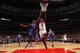 CHICAGO, IL - JANUARY 1: Bobby Portis #5 of the Chicago Bulls goes for the dunk against Langston Galloway #2 of the New York Knicks during the game on January 1, 2016 at United Center in Chicago, Illinois. NOTE TO USER: User expressly acknowledges and agr