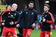 Liverpool's Slovakian defender Martin Skrtel (L), Liverpool's German midfielder Emre Can and Liverpool's English midfielder Adam Lallana (R) warm up ahead of the English Premier League football match between Watford and Liverpool at Vicarage Road Stadium