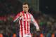STOKE ON TRENT, ENGLAND - OCTOBER 27: Xherdan Shaqiri of Stoke City celebrates after scoring a penalty during the penalty shoot-out during the Capital One Cup Fourth Round match between Stoke City and Chelsea at Britannia Stadium on October 27, 2015 in St