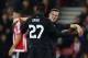SOUTHAMPTON, ENGLAND - DECEMBER 02: Divock Origi of Liverpool (27) celebrates with Brad Smith as he scores their sixth goal and completes his hat trick during the Capital One Cup quarter final match between Southampton and Liverpool at St Mary's Stadium