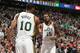 SALT LAKE CITY, UT - DECEMBER 11: Alec Burks #10 high fives teammate Derrick Favors #15 of the Utah Jazz during the game against the Oklahoma City Thunder on December 11, 2015 at Vivint Smart Home Arena in Salt Lake City, Utah. NOTE TO USER: User expressl