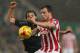 STOKE ON TRENT, ENGLAND - JANUARY 05: Joe Allen of Liverpool and Xherdan Shaqiri of Stoke City during the Capital One Cup Semi Final, First Leg, between Stoke City and Liverpool at Britannia Stadium on January 5, 2016 in Stoke on Trent, England. (Photo b
