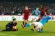 Napoli's Argentinian-French forward Gonzalo Higuain (R) fights for the ball with Roma's defender from Germany Antonio Rudiger (UP) and Roma's goalkeeper from Poland Wojciech Szczesny during the Italian Serie A football match SSC Napoli vs AS Roma on Decem