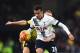 WATFORD, ENGLAND - DECEMBER 28: Dele Alli of Tottenham Hotspur and Almen Abdi of Watford compete for the ball during the Barclays Premier League match between Watford and Tottenham Hotspur at Vicarage Road on December 28, 2015 in Watford, England. (Photo