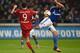 Bayern Munich's Polish striker Robert Lewandowski (L) and Schalke's defender Benedikt Hoewedes vie for the ball during the German first division Bundesliga football match FC Schalke 04 vs FC Bayern Munich in Gelsenkirchen, western Germany, on November 21,