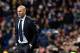 Real Madrid's French coach Zinedine Zidane looks at players during the Spanish league football match Real Madrid CF vs RC Deportivo La Coruna at the Santiago Bernabeu stadium in Madrid on January 9, 2016. AFP PHOTO / GERARD JULIEN / AFP / GERARD JULIEN
