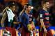 Barcelona's Argentinian forward Lionel Messi is congratuled by teammates after his hat-trick next to Barcelona's Brazilian forward Neymar (L) and Barcelona's Belgian defender Thomas Vermaelen (R) at the end of the Spanish league football match FC Barcelon