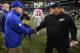 Tom Coughlin (left)