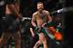 LAS VEGAS, NEVADA - DECEMBER 12: Conor McGregor of Ireland celebrates after defeating Jose Aldo of Brazil in their featherweight championship bout during the UFC 194 event inside MGM Grand Garden Arena on December 12, 2015 in Las Vegas, Nevada. (Photo b