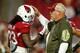 GLENDALE, AZ - NOVEMBER 22: Head coach Bruce Arians of the Arizona Cardinals pats running back Chris Johnson #23 (left) on the helmet before the NFL game against the Cincinnati Bengals at the University of Phoenix Stadium on November 22, 2015 in Glendale,