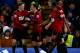 West Bromwich Albion's Irish midfielder James McClean (L) celebrates with teammates after scoring their second goal during the English Premier League football match between Chelsea and West Bromwich Albion at Stamford Bridge in London on January 13, 2016.