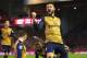 LIVERPOOL, ENGLAND - JANUARY 13: Olivier Giroud of Arsenal celebrates scoring his team's third goal during the Barclays Premier League match between Liverpool and Arsenal at Anfield on January 13, 2016 in Liverpool, England. (Photo by Alex Livesey/Getty