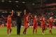 Liverpool's German manager Jurgen Klopp (2L) leads his players in saluting the crowd with (L-R) Liverpool's English midfielder Jordon Ibe, Liverpool's Belgian striker Divock Origi, Liverpool's Brazilian midfielder Roberto Firmino, Liverpool's Zaire-born B